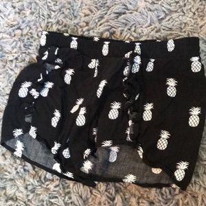 Black pineapple shorts